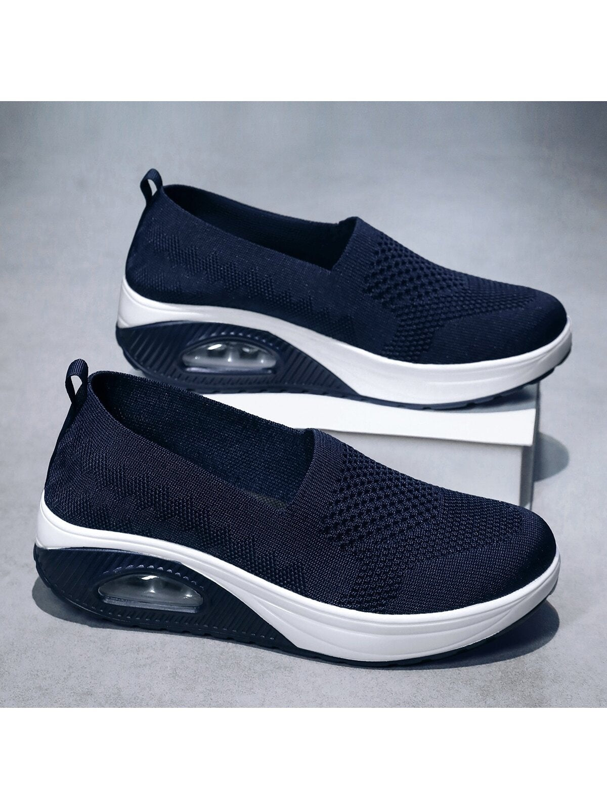 Slip-on shoes for women with knit upper, low rounded opening and thick air cushion sole - navy
