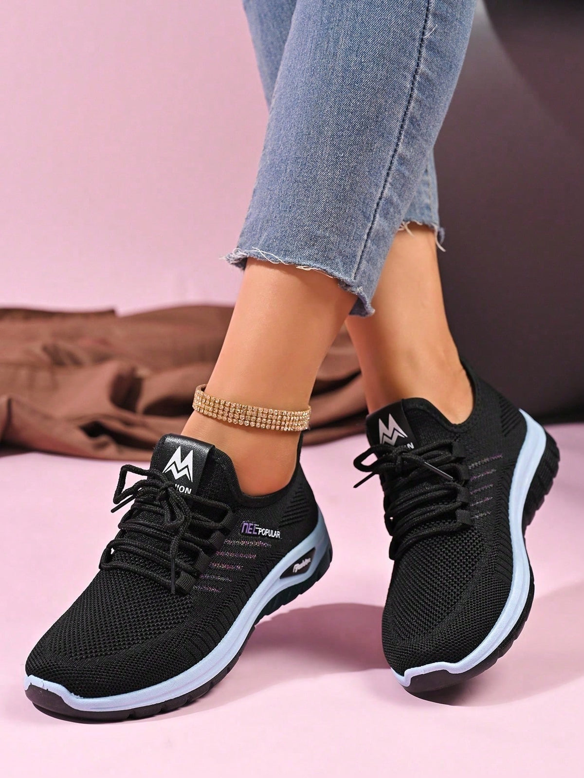Knit trainers for women with elastic laces, small emblem on the tongue and thick curved sole - view 6