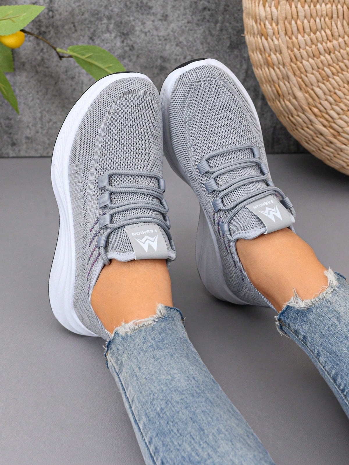 Knit trainers for women with elastic laces, small emblem on the tongue and thick curved sole - view 8