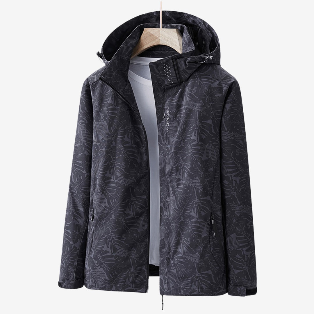 Women's waterproof wind jacket with a leaf print and hood - black