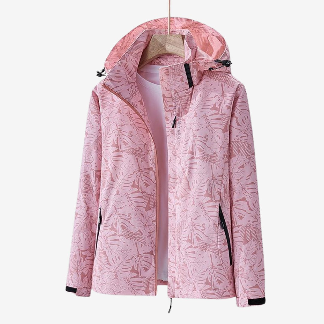 Women's waterproof wind jacket with a leaf print and hood - pink
