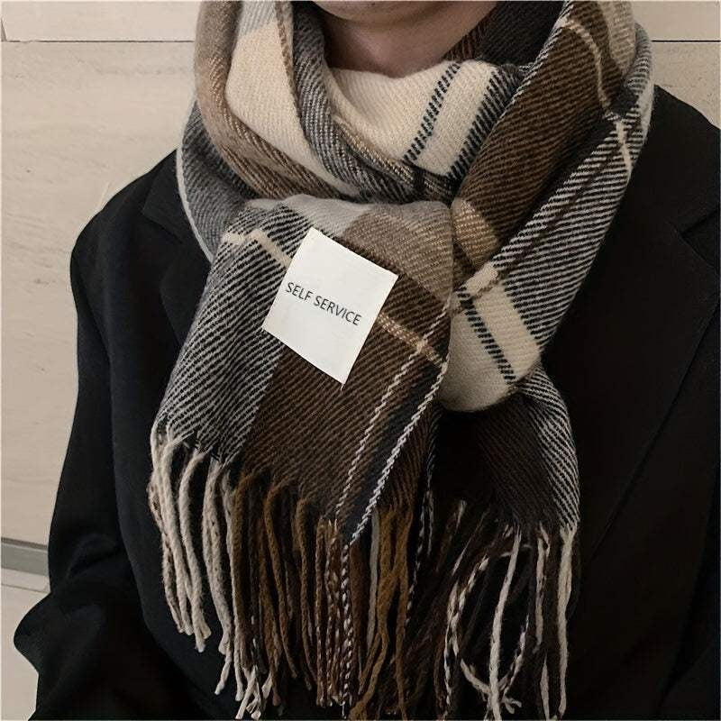 Women's woven scarf in a large check with a fringe and a white label