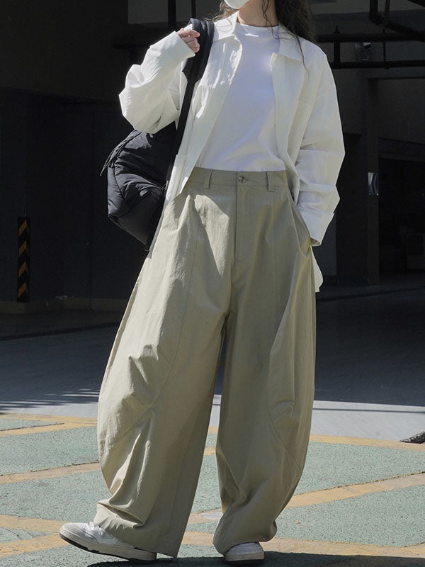 Wide-leg barrel trousers in cotton with curved knee seams