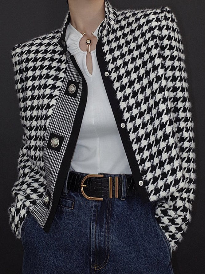 Cropped black and white houndstooth jacket with a stand collar