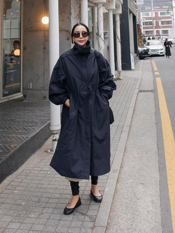 Longline hooded coat with a drawstring waist and deep pockets