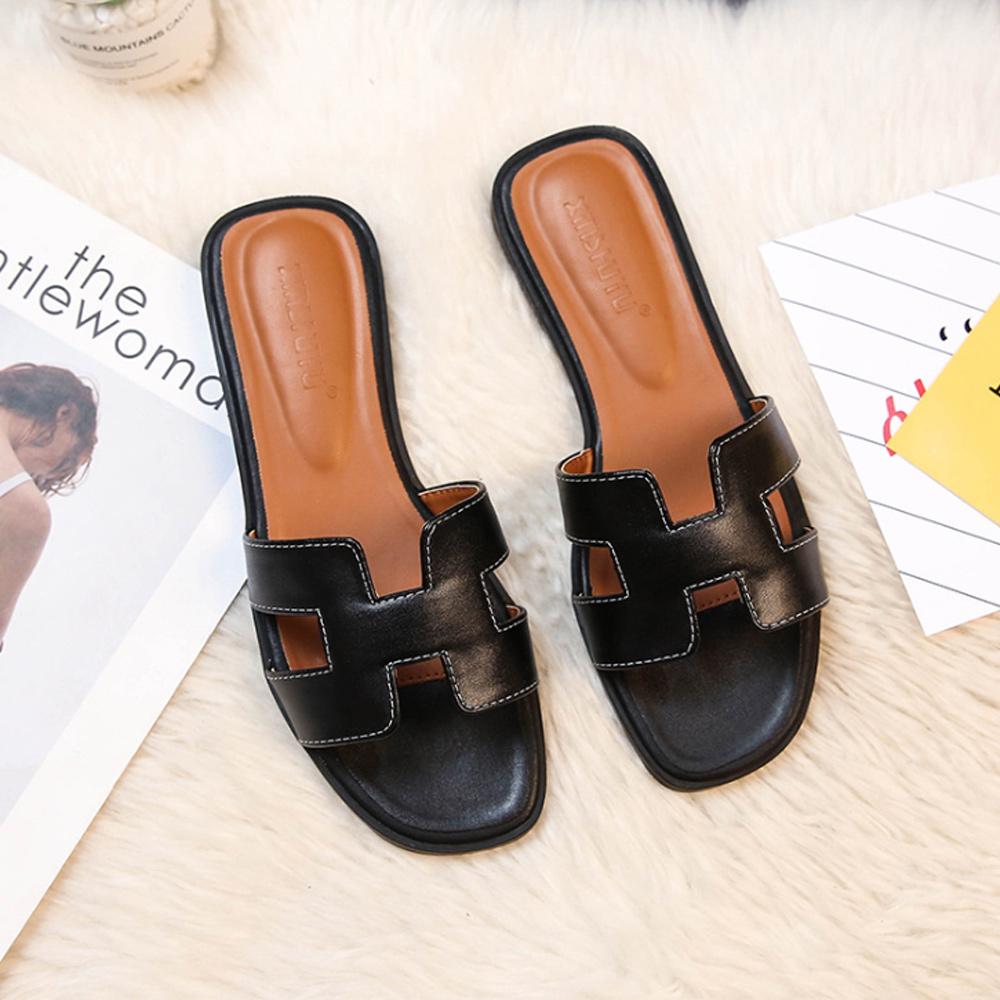 Women's leather H-strap slip-on sandals – Saint Dor UK – lifestyle shot