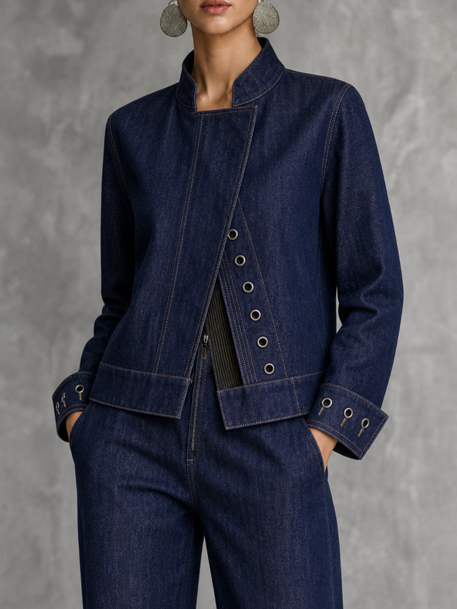 Cropped indigo denim jacket with a stand collar and eyelet trim in indigo
