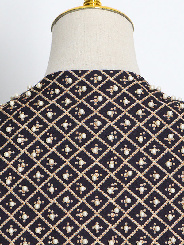 Beaded blazer with an ornamental pattern and a deep V-neck