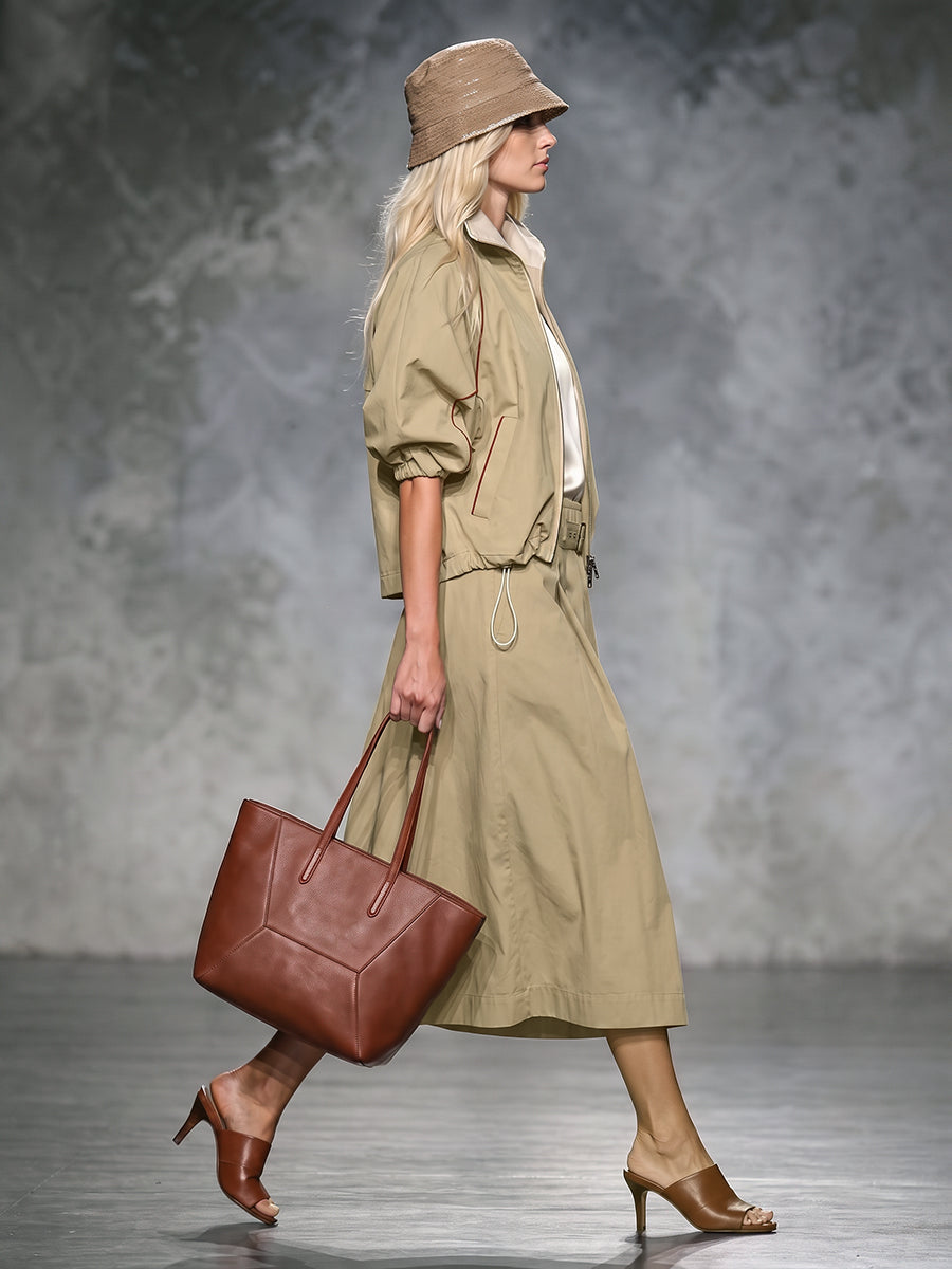 Khaki jacket with rust contrast piping and gathered puff sleeves
