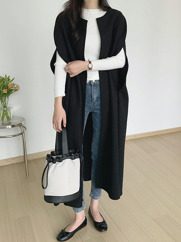 Sleeveless longline cape with a round neck and open front