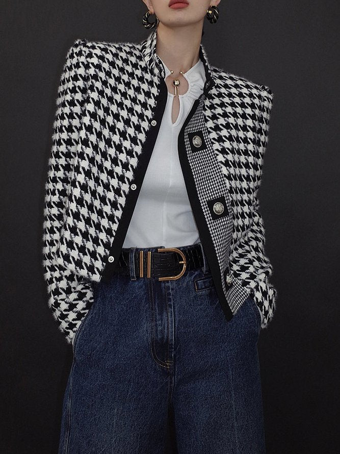 Cropped black and white houndstooth jacket with a stand collar