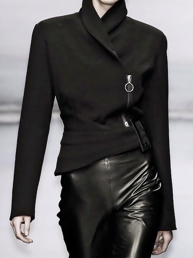 Black asymmetric jacket with a wrap front and a diagonal zip in black