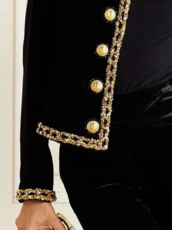 Short black velvet jacket with braid trim and gold-tone buttons