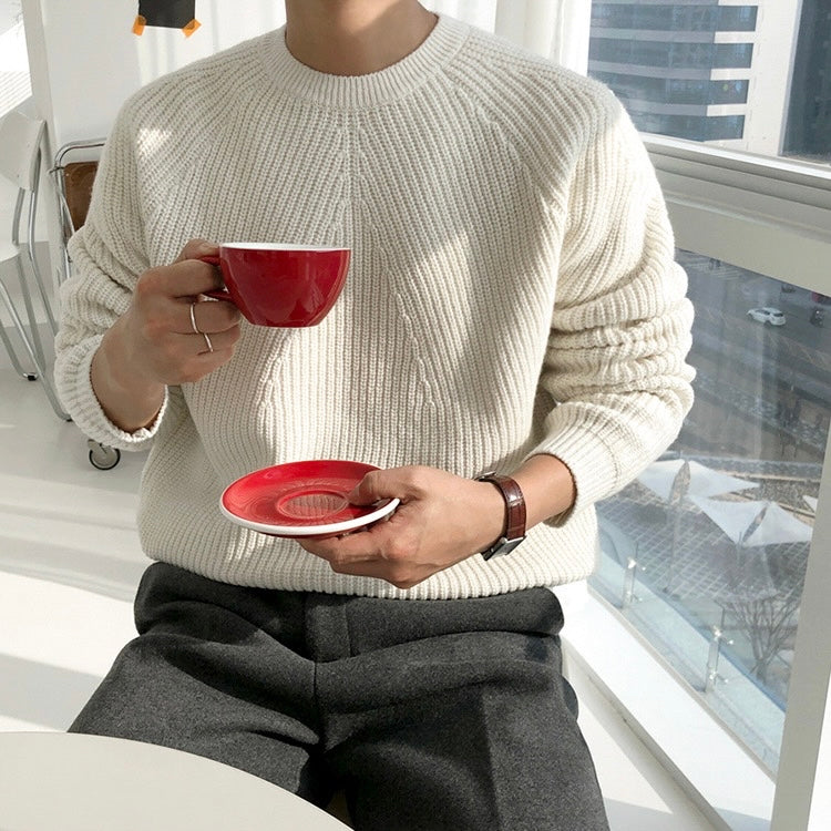Men's ribbed jumper showing raglan sleeve and dropped shoulder
