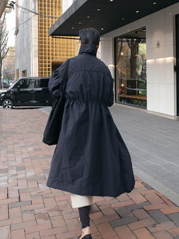 Longline hooded coat with a drawstring waist and deep pockets