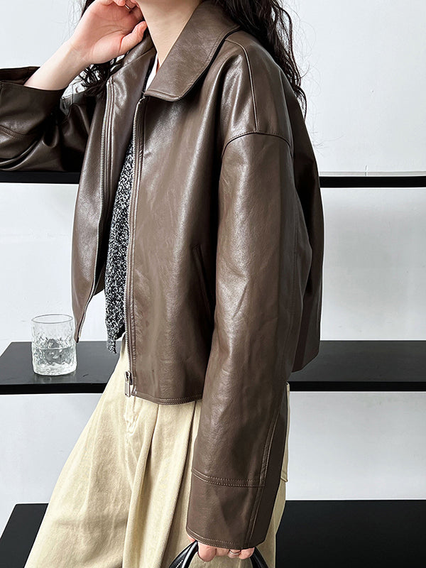 Boxy faux leather jacket with a wide shirt collar and zip front