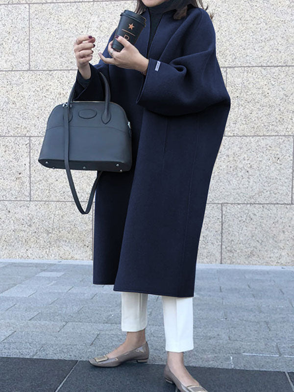 Collarless longline coat with dropped sleeves and an open front