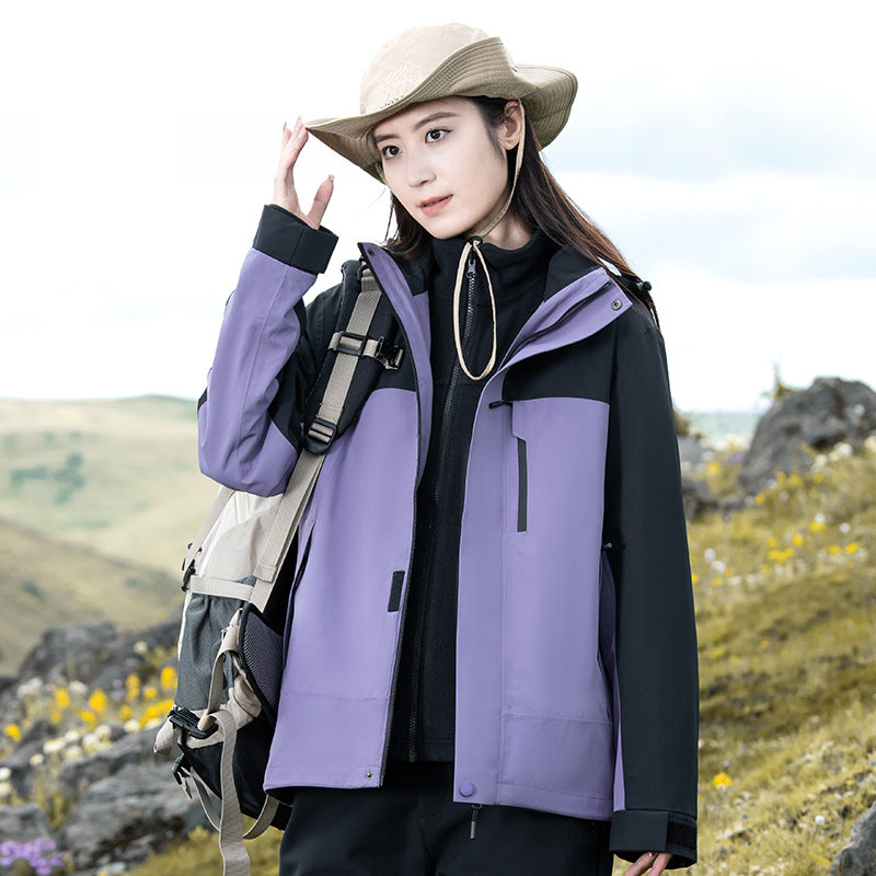 Women's 3-in-1 hooded outdoor jacket with a zip chest pocket and zip-out inner jacket