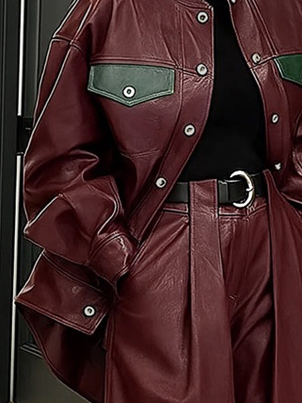 Oversized burgundy faux leather jacket with green contrast pocket flaps