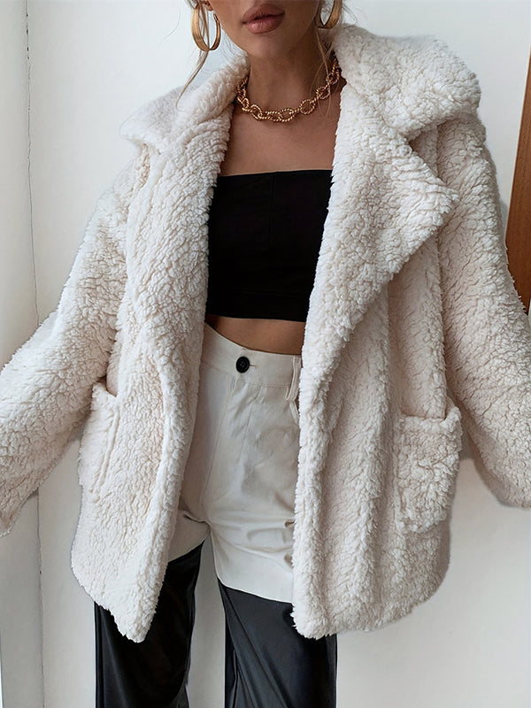 Cream teddy jacket in soft sherpa with a wide lapel and patch pockets