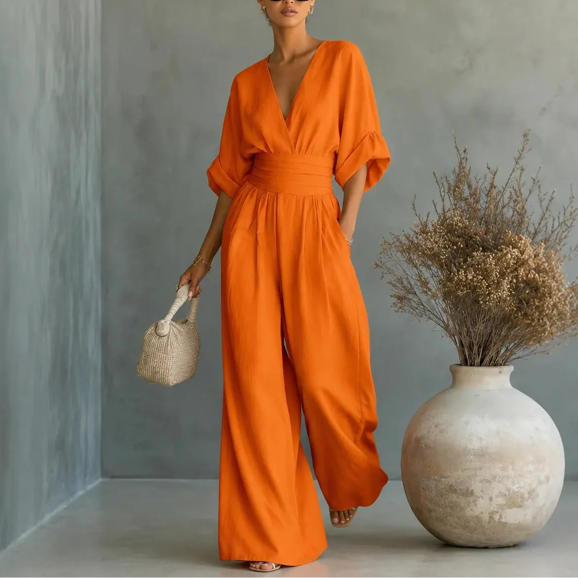 Women's wide leg V-neck jumpsuit in Burnt Orange