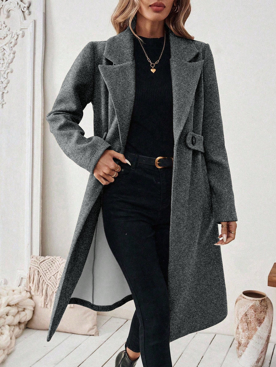 Longline coat with a wide notch lapel and a button at the waist in deep grey