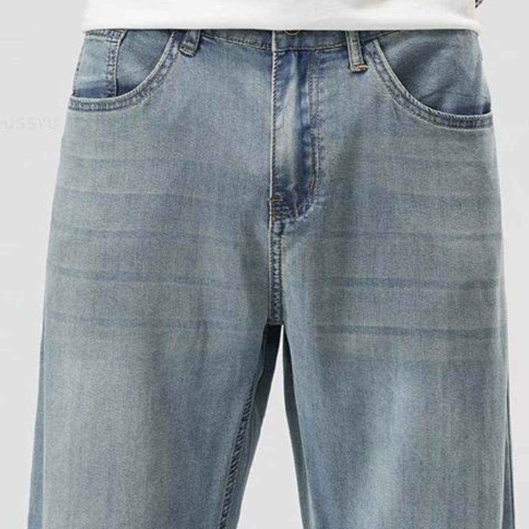 Men's Relaxed Straight-Cut Jeans - product view | SAINT DOR