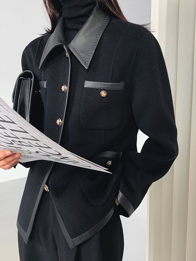 Black jacket with faux leather trim and gold-tone buttons