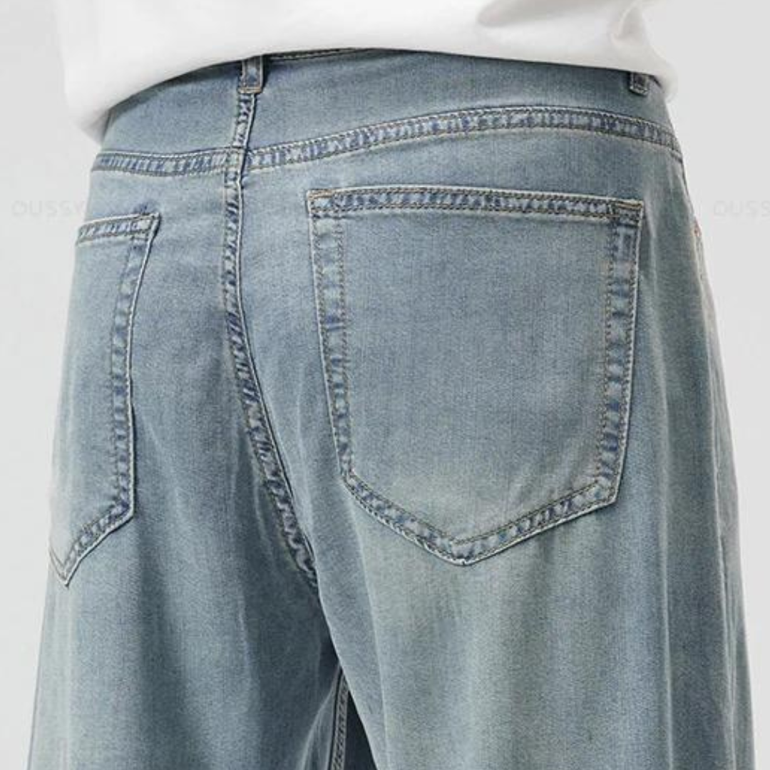Men's Relaxed Straight-Cut Jeans - product view | SAINT DOR