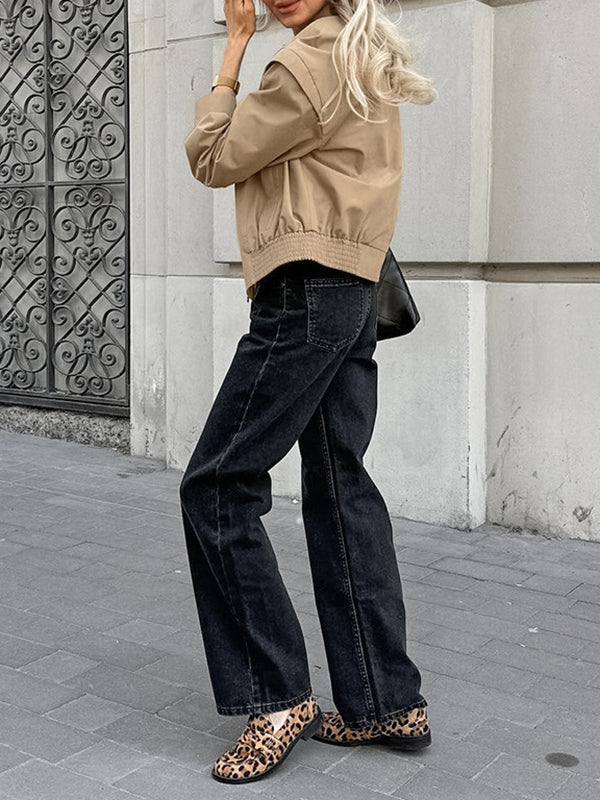 Boxy khaki utility jacket with a wide collar and flaps over the shoulder