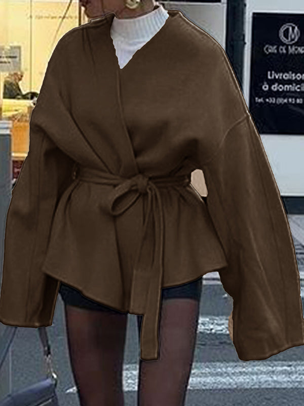 Short wrap coat with a deep V-neck and a self-tie belt