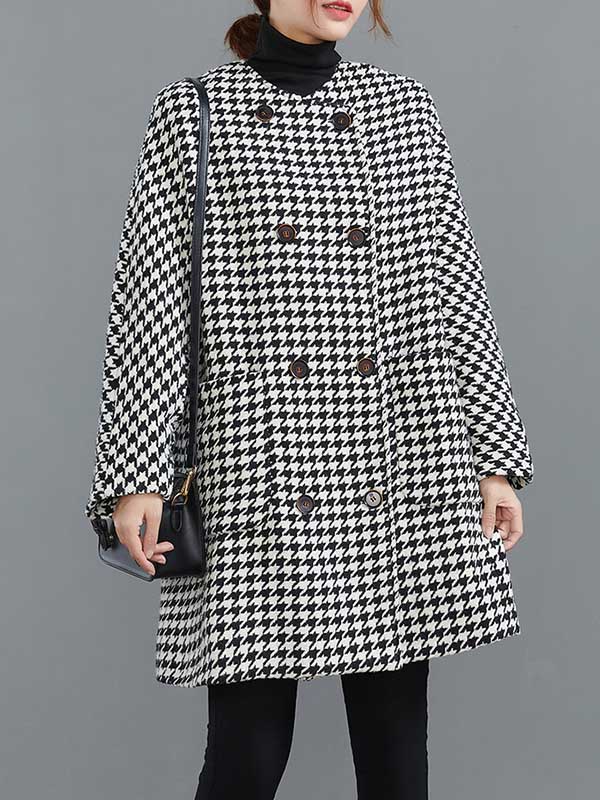 Houndstooth swing coat with a collarless round neck and two rows of buttons in black and white