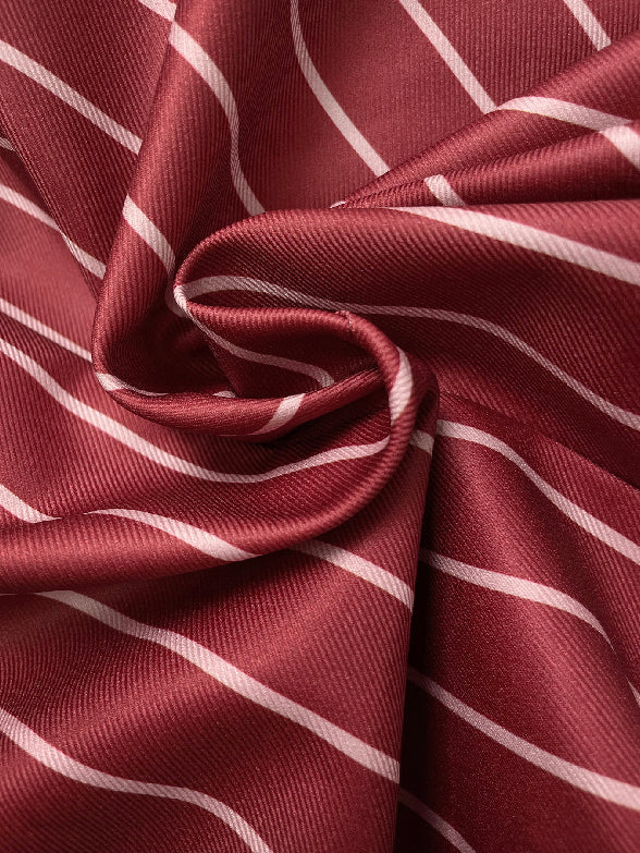 Striped blazer with a notched lapel and a single button