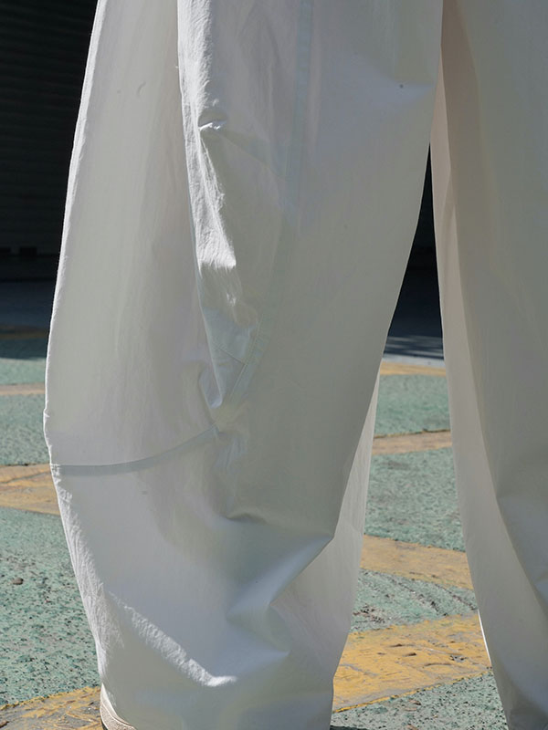Wide-leg barrel trousers in cotton with curved knee seams