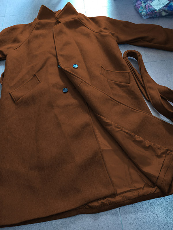 Belted longline coat with a notch lapel and welt pockets