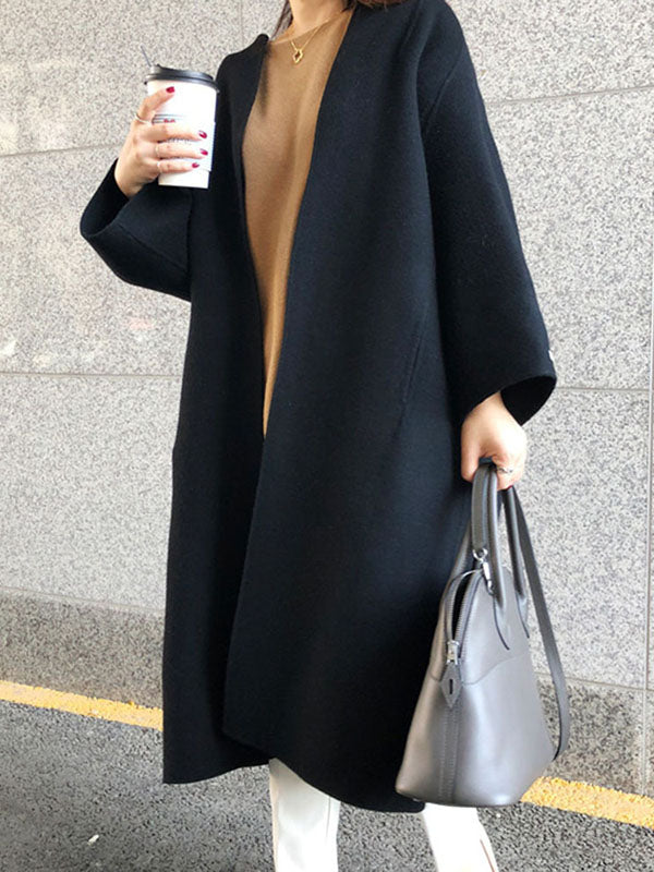 Collarless longline coat with dropped sleeves and an open front in camel