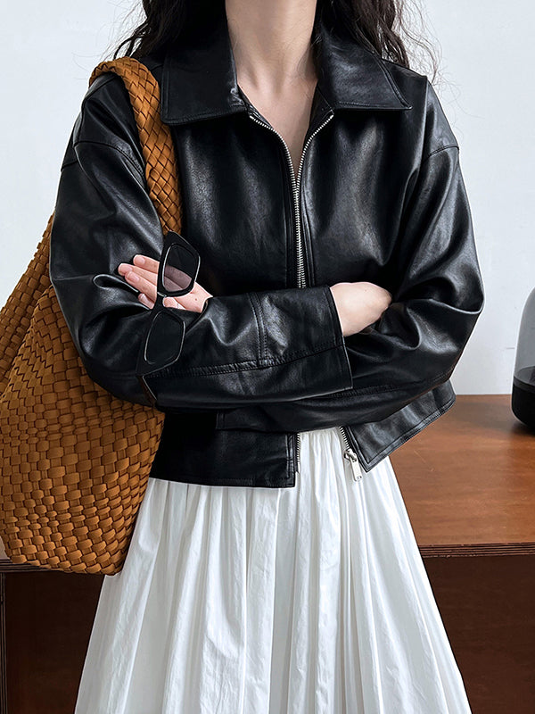Boxy faux leather jacket with a wide shirt collar and zip front