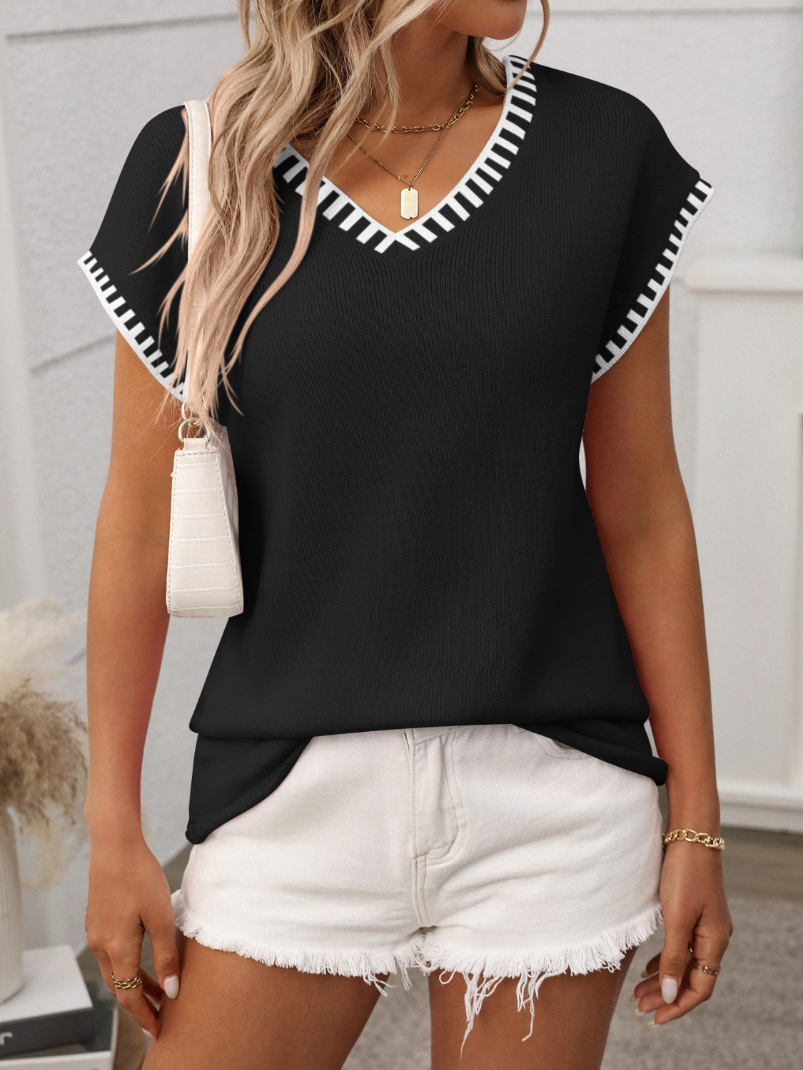 Knit top with a contrast trim along the V-neck and short sleeves – view 13