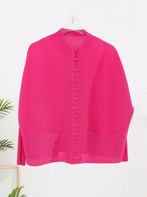 Pleated jacket with a stand collar, covered buttons and wide sleeves in fuchsia