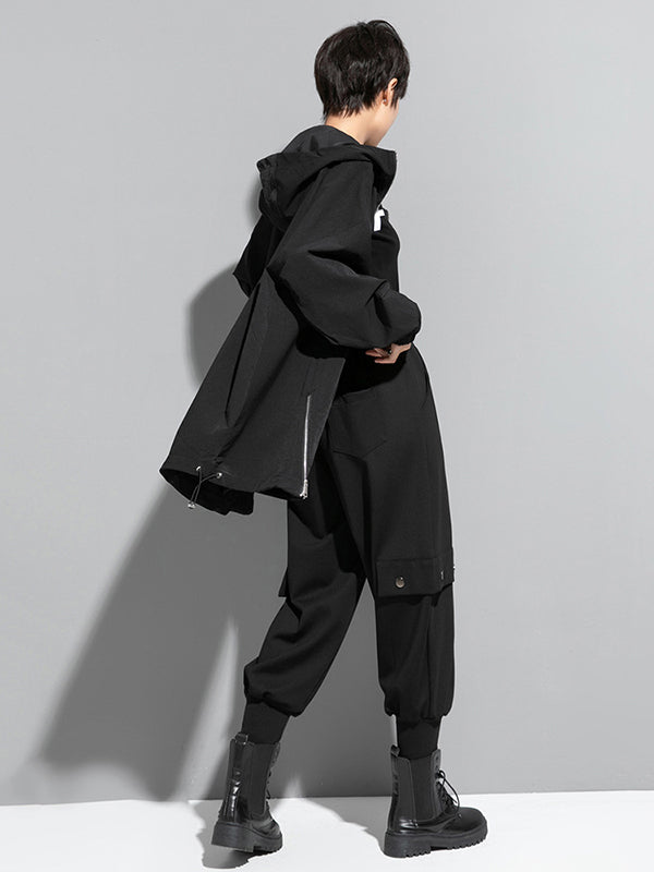 Oversized black hooded jacket with an off-centre zip and drawstring hem