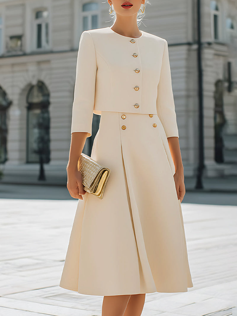 Ivory cropped jacket with a round neck and gold-tone buttons