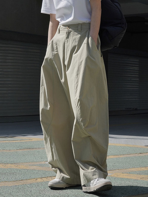 Wide-leg barrel trousers in cotton with curved knee seams in khaki
