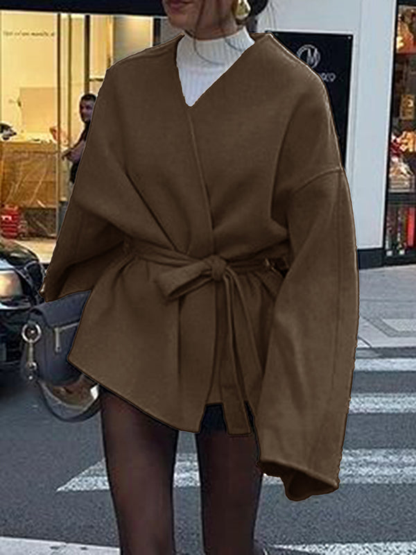 Short wrap coat with a deep V-neck and a self-tie belt