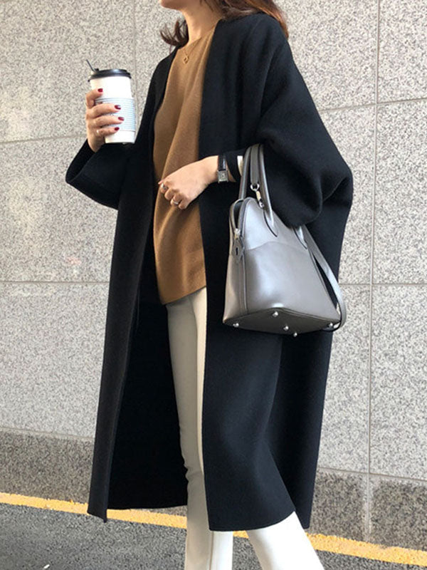 Collarless longline coat with dropped sleeves and an open front