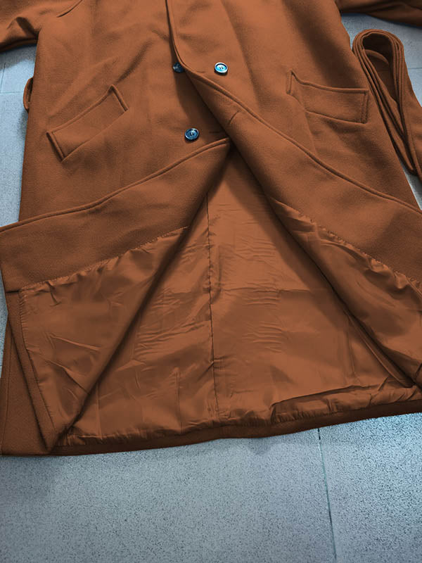 Belted longline coat with a notch lapel and welt pockets