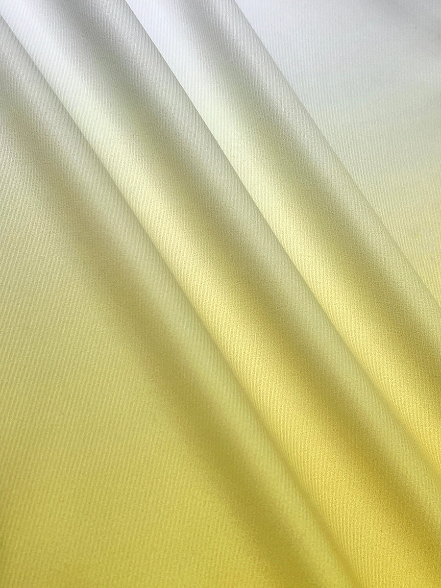 Cropped jacket fading from white at the shoulder to yellow at the hem