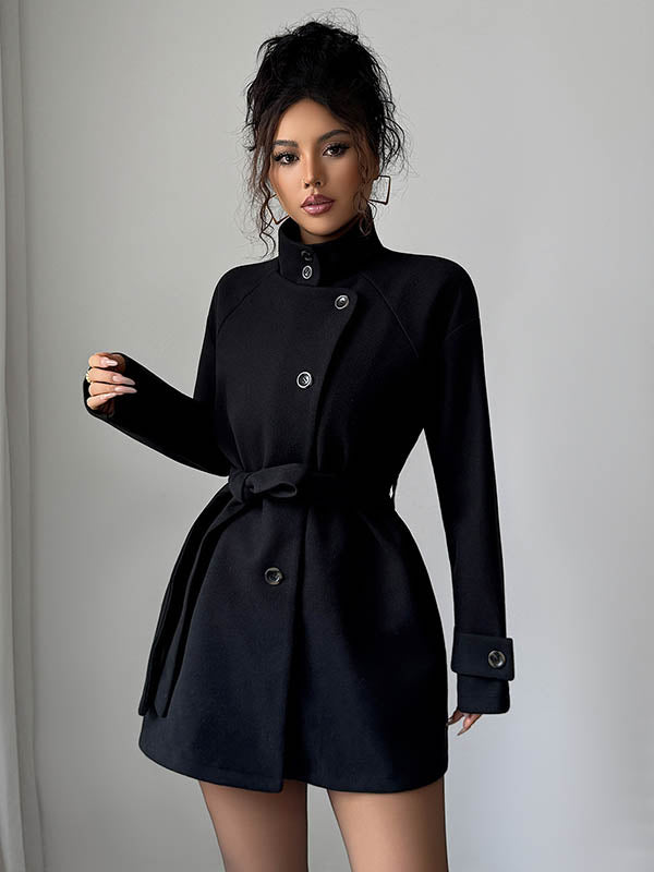 Short belted coat with a stand collar and an asymmetric button front