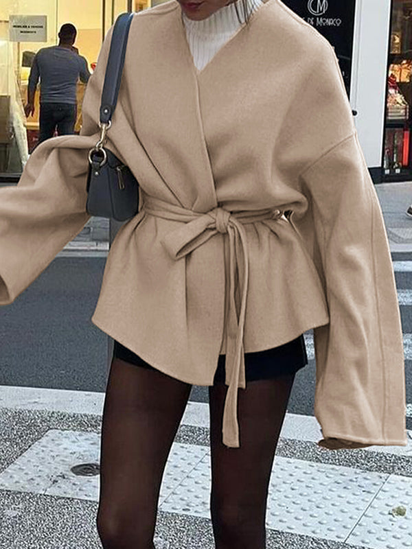 Short wrap coat with a deep V-neck and a self-tie belt