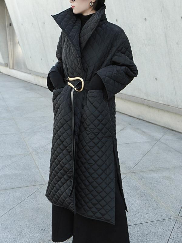 Long black quilted wrap coat with a fold-over collar and ring-buckle belt