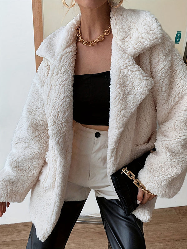 Cream teddy jacket in soft sherpa with a wide lapel and patch pockets in cream